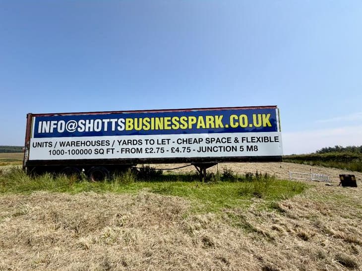 Roadside billboard at Shotts Business Park — units, warehouses and yards to let from £2.75 per sq ft, Junction 5 M8